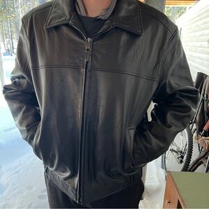Black 100% genuine leather jacket size large —classic biker moto style.
